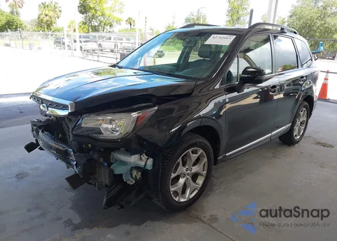 2018 Subaru Forester 2.5I Touring z USA, uszkodzony, nr VIN JF2SJAWC2JH574536